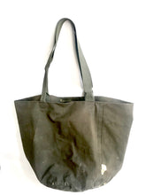 Load image into Gallery viewer, green canvas bag made of duflle bag repaired with kintsugi gold paste
